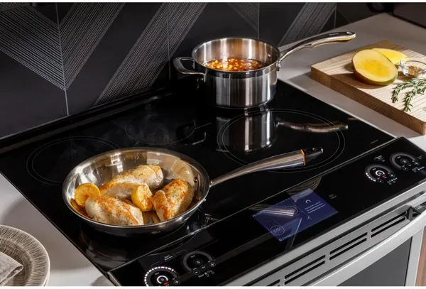 Food cooks on an induction stove top
